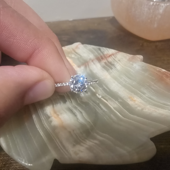 Dazzling 14k White Gold Ring Featuring 1k Moissanite And .19k Diamonds